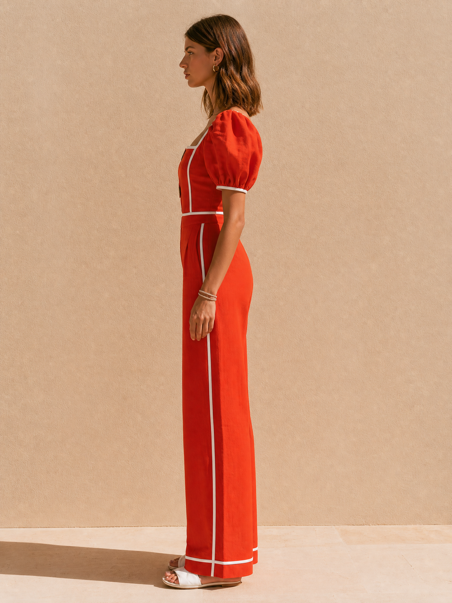 Red Linen Puff-sleeve jumpsuit With White Piping.