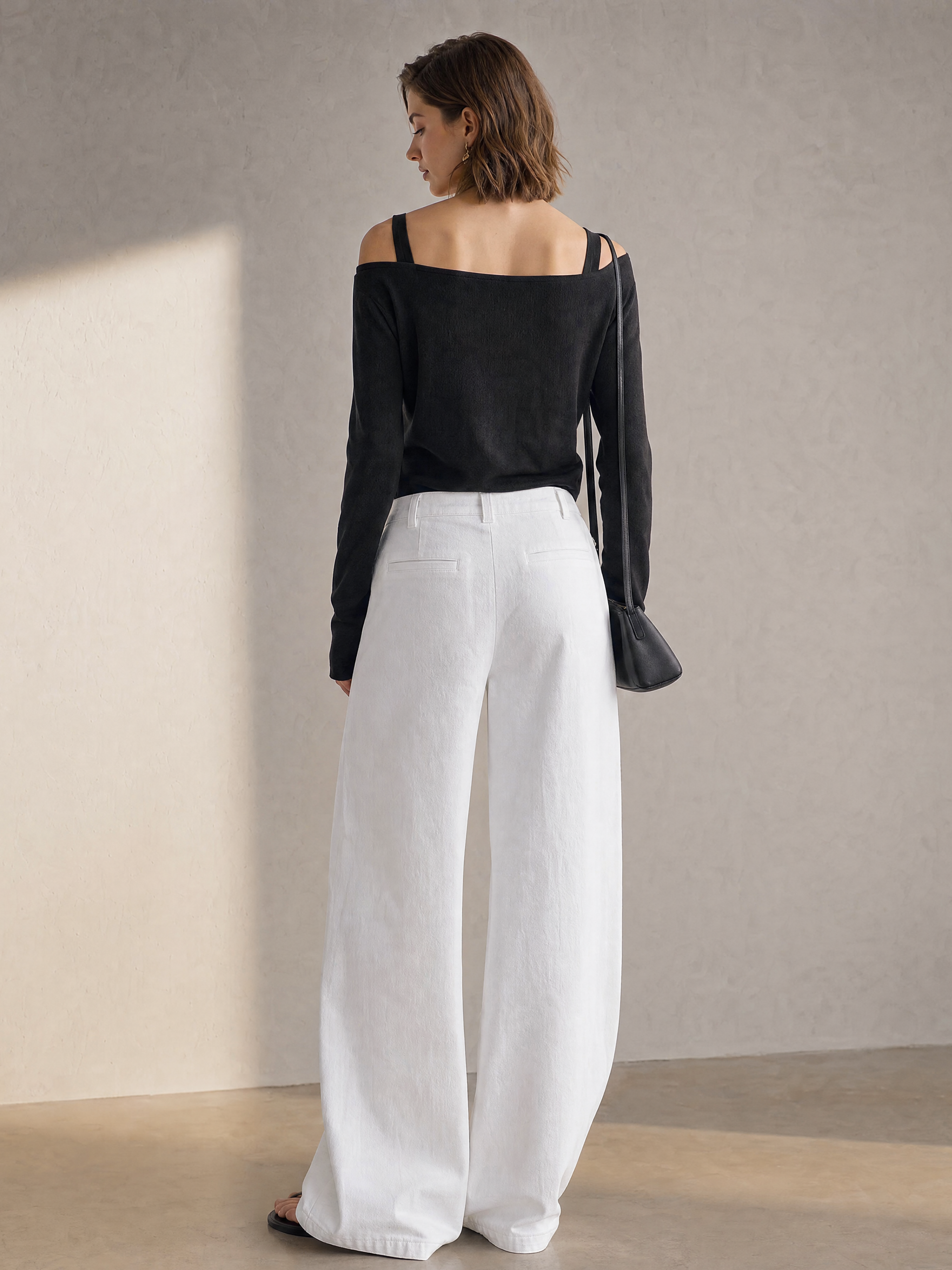 Elegant Black Off-Shoulder Top & White Wide-Leg Jeans Set