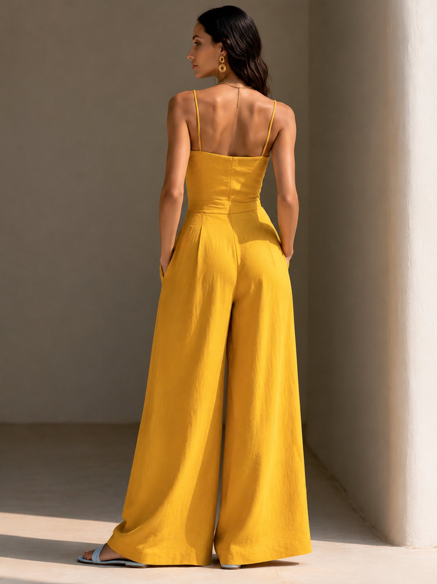 Elegant yellow summer jumpsuit with delicate straps