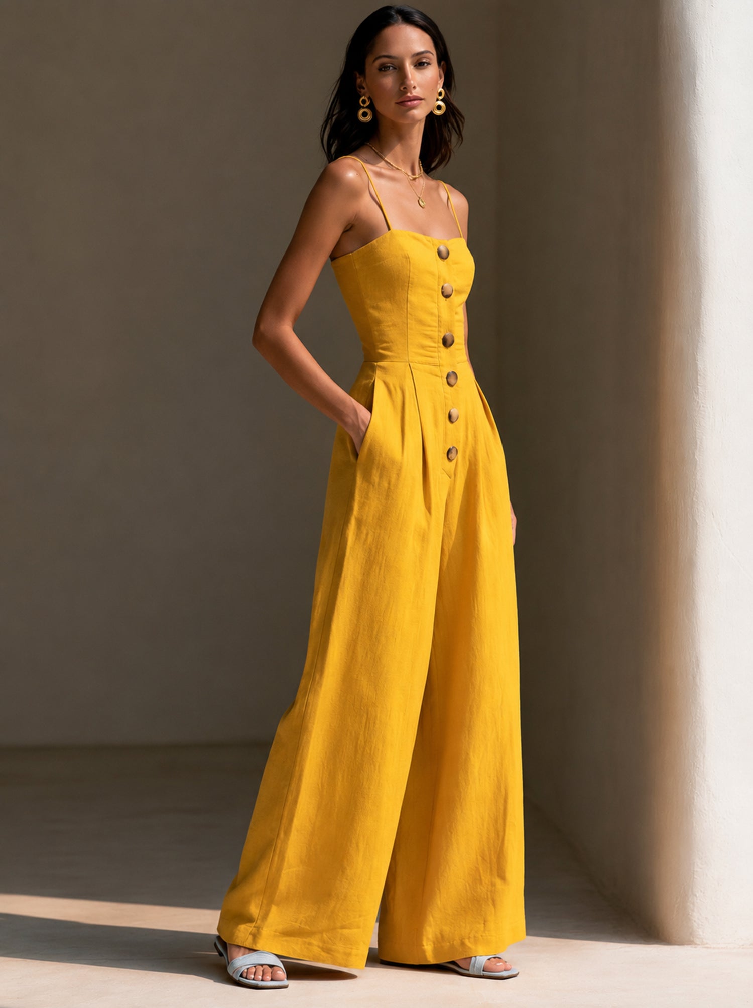 Elegant yellow summer jumpsuit with delicate straps