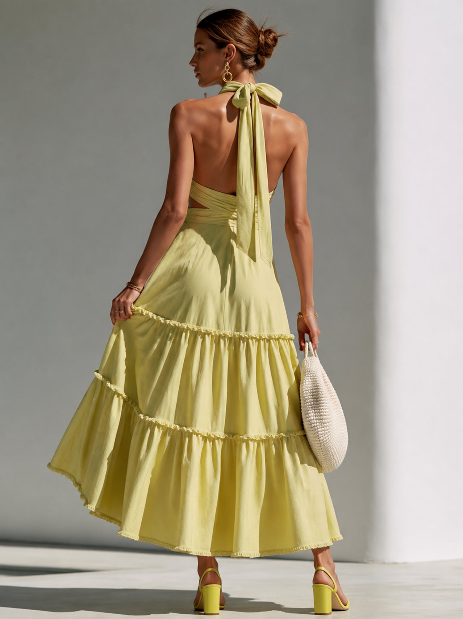 Pale Lemon Halter-Neck Dress With Criss-Cross Design & Ruffled Hem – Perfect For Island Getaways