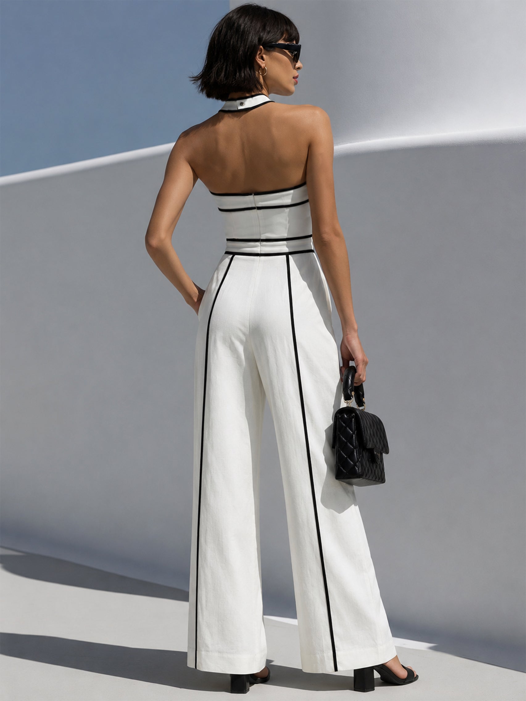 White Halter Neck Jumpsuit With Black Contrast Piping