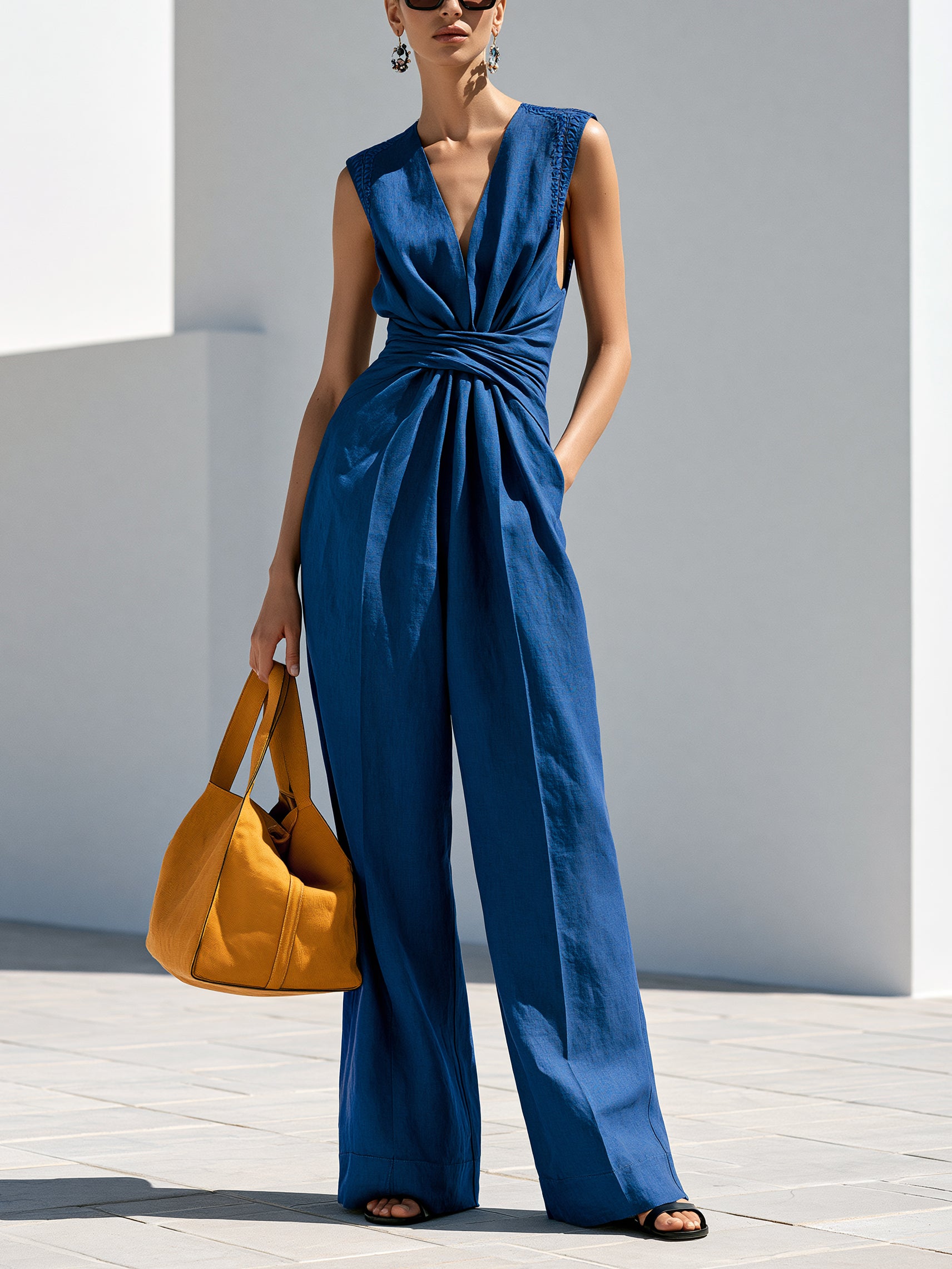 Embroidered Sleeveless Jumpsuit With V-Neck And Waist Twist