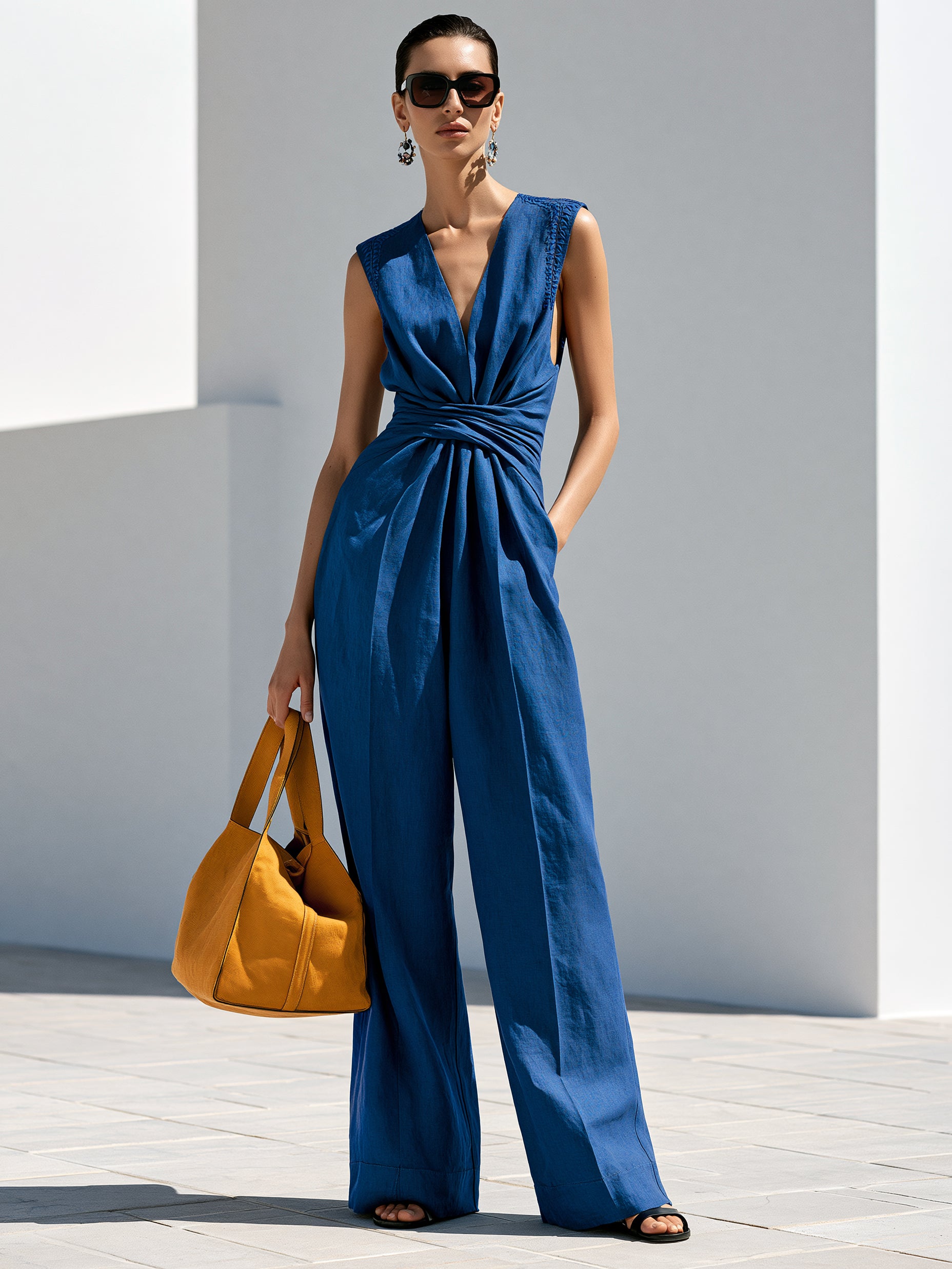 Embroidered Sleeveless Jumpsuit With V-Neck And Waist Twist