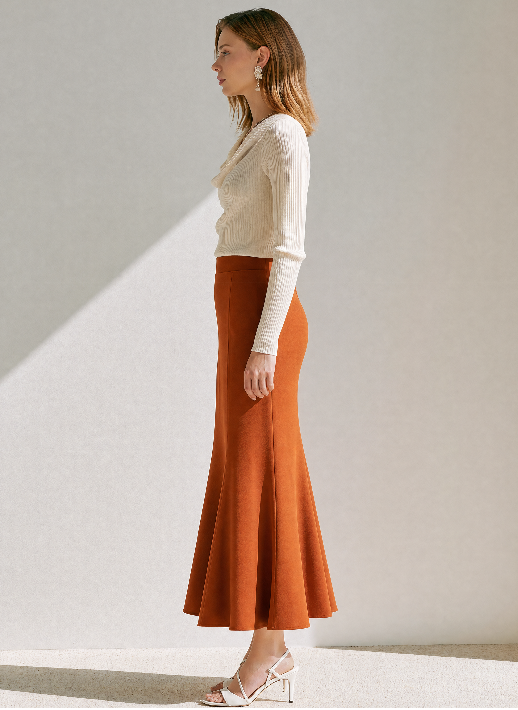 Elegant Ribbed Knit Top And Caramel Orange Midi Skirt Set