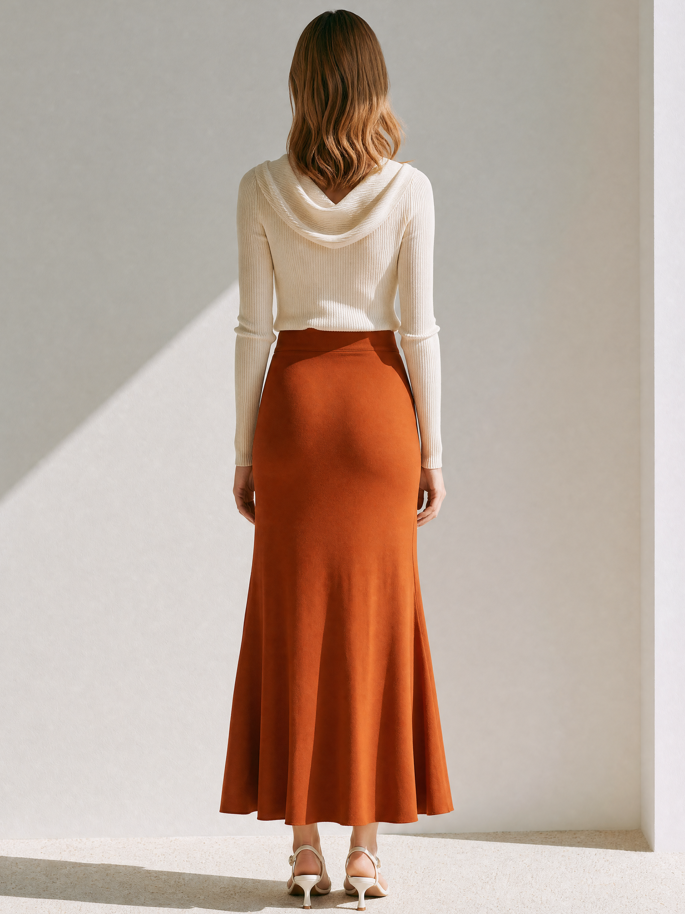 Elegant Ribbed Knit Top And Caramel Orange Midi Skirt Set