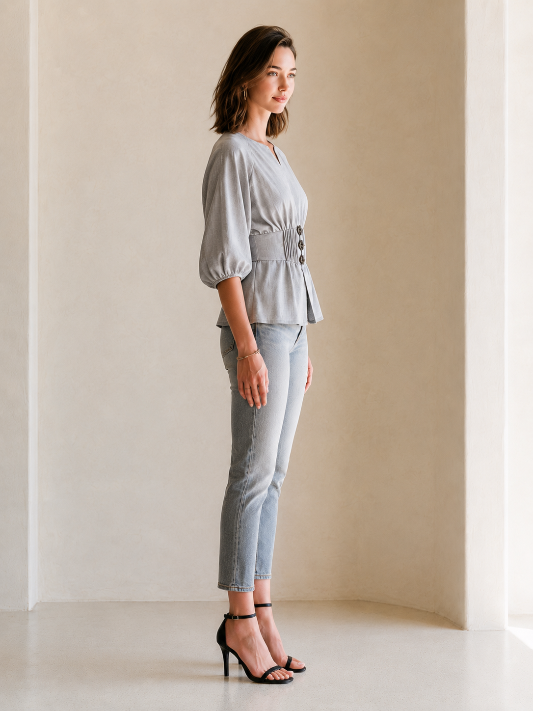 Elegant Grey Fitted Top With Puff Sleeves And A Small V-neck.