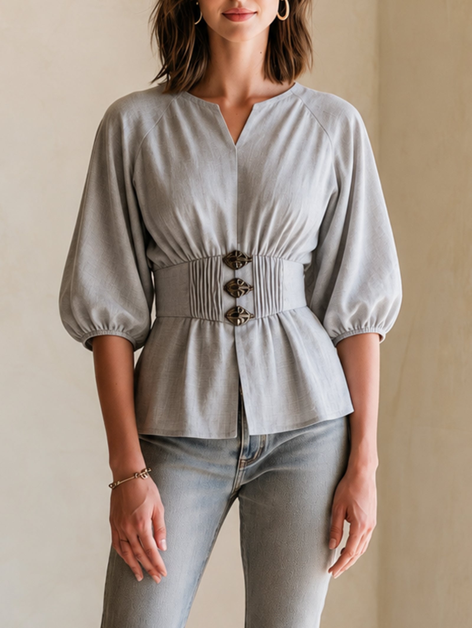 Elegant Grey Fitted Top With Puff Sleeves And A Small V-neck.
