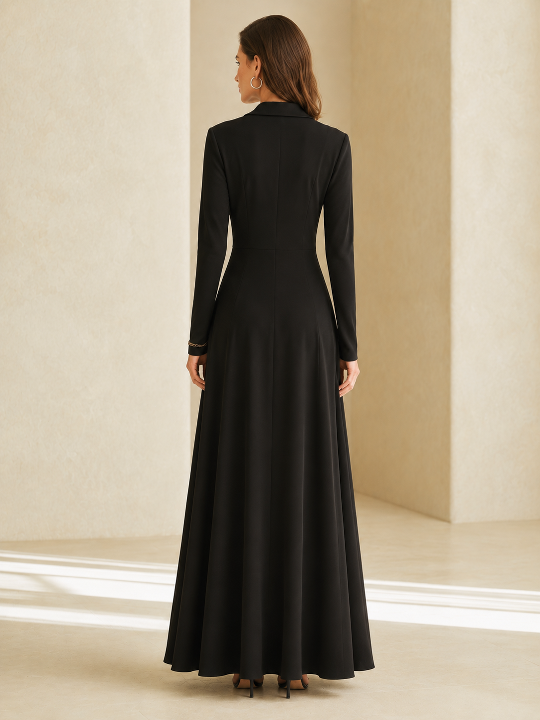 Elegant Black Long-sleeved Maxi Dress With A V-neck And Leopard-print Paneling.