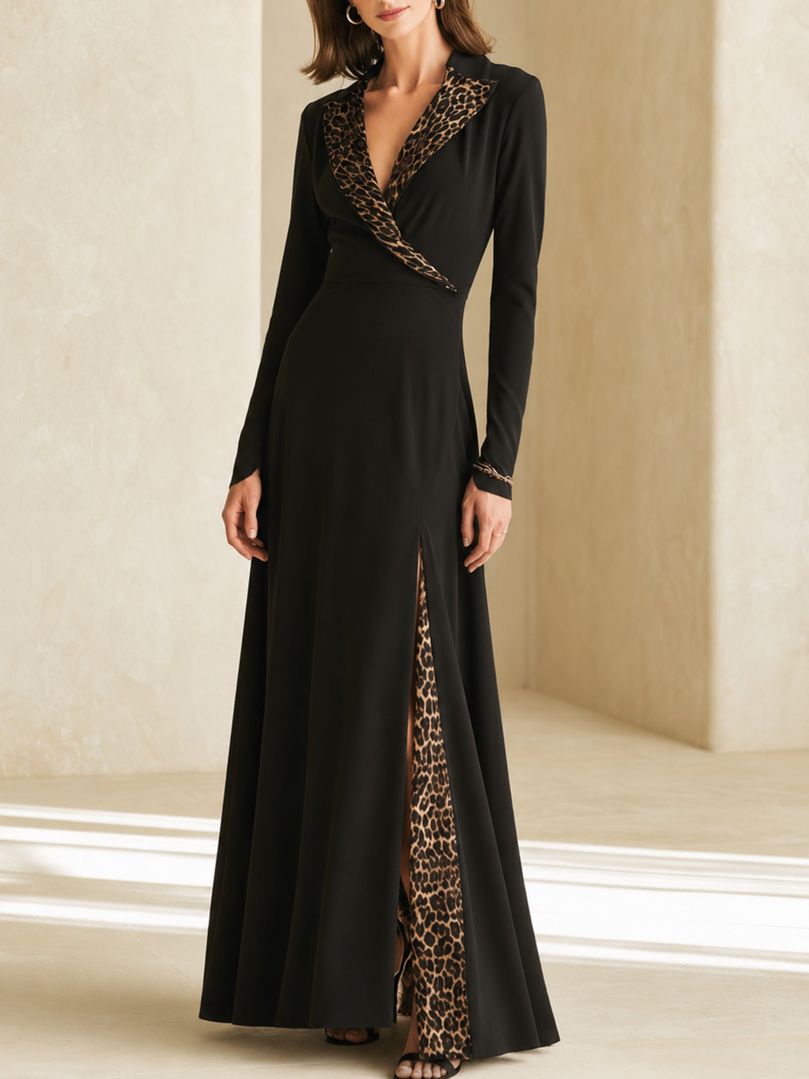 Elegant Black Long-sleeved Maxi Dress With A V-neck And Leopard-print Paneling.