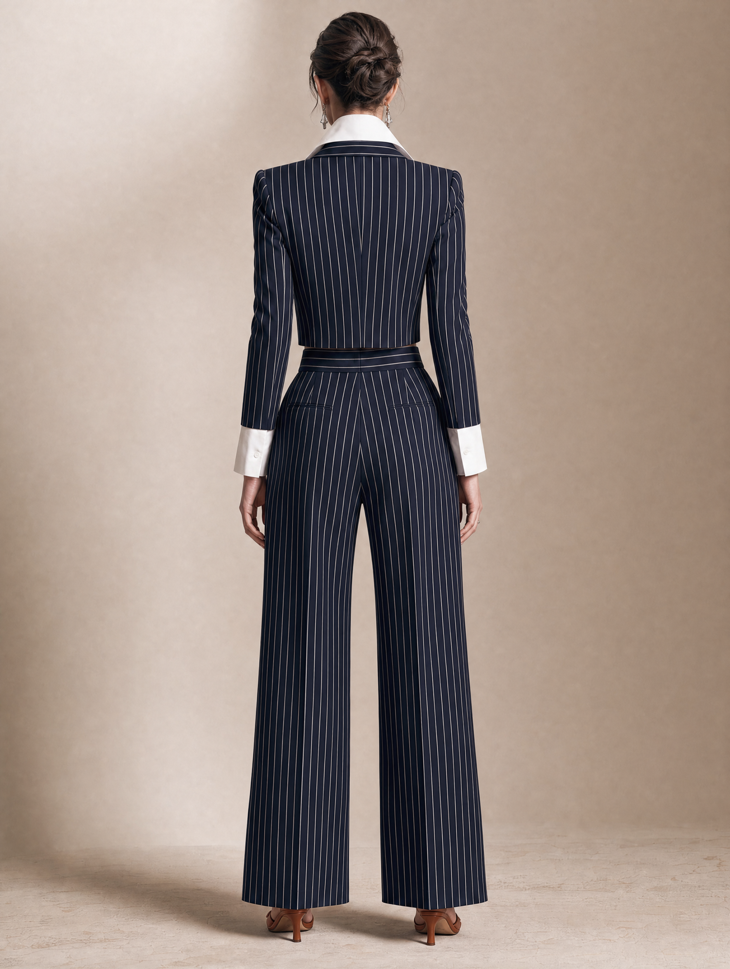 Elegant Black Pinstriped Jacket And Trousers Set With A Faux-layered Design